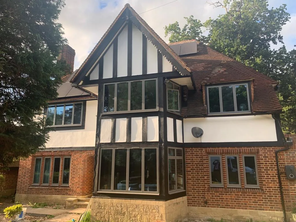 Tudor-style elevation with anthracite flush windows