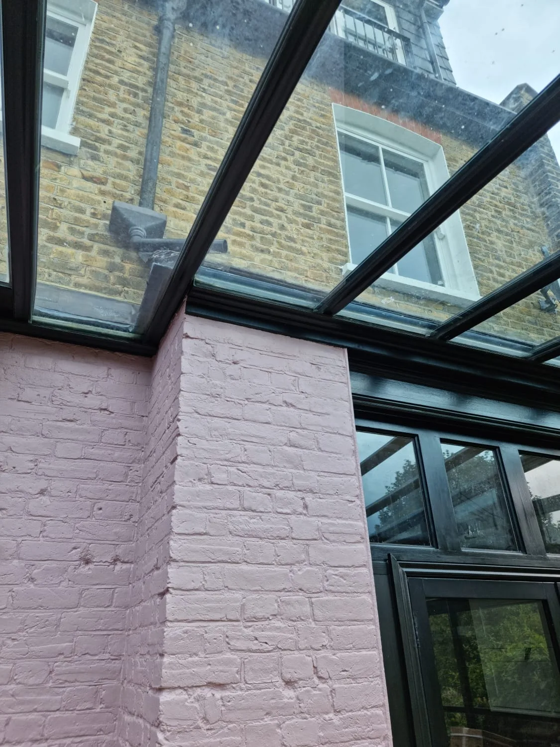 Looking up through a glazed orangery roof